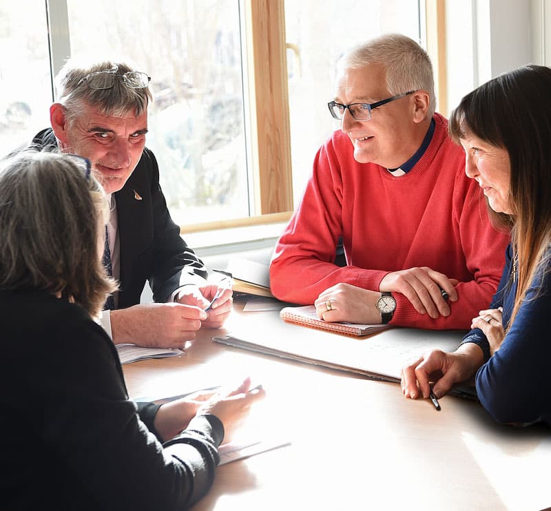 Students and mentors in discussion